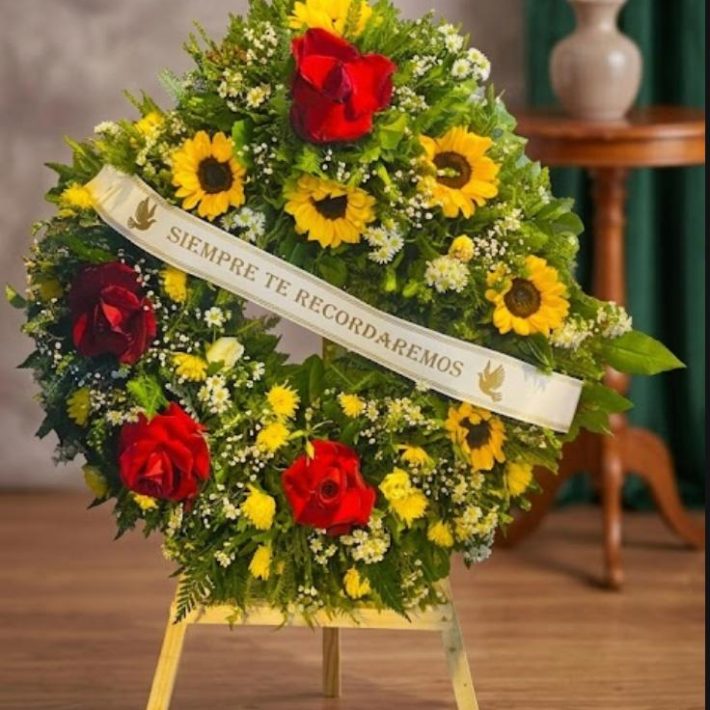 Corona Condolencias  flores rojas con amarillos