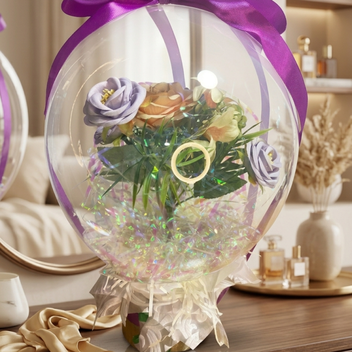 Globo transparente  con lindo arreglo  floral